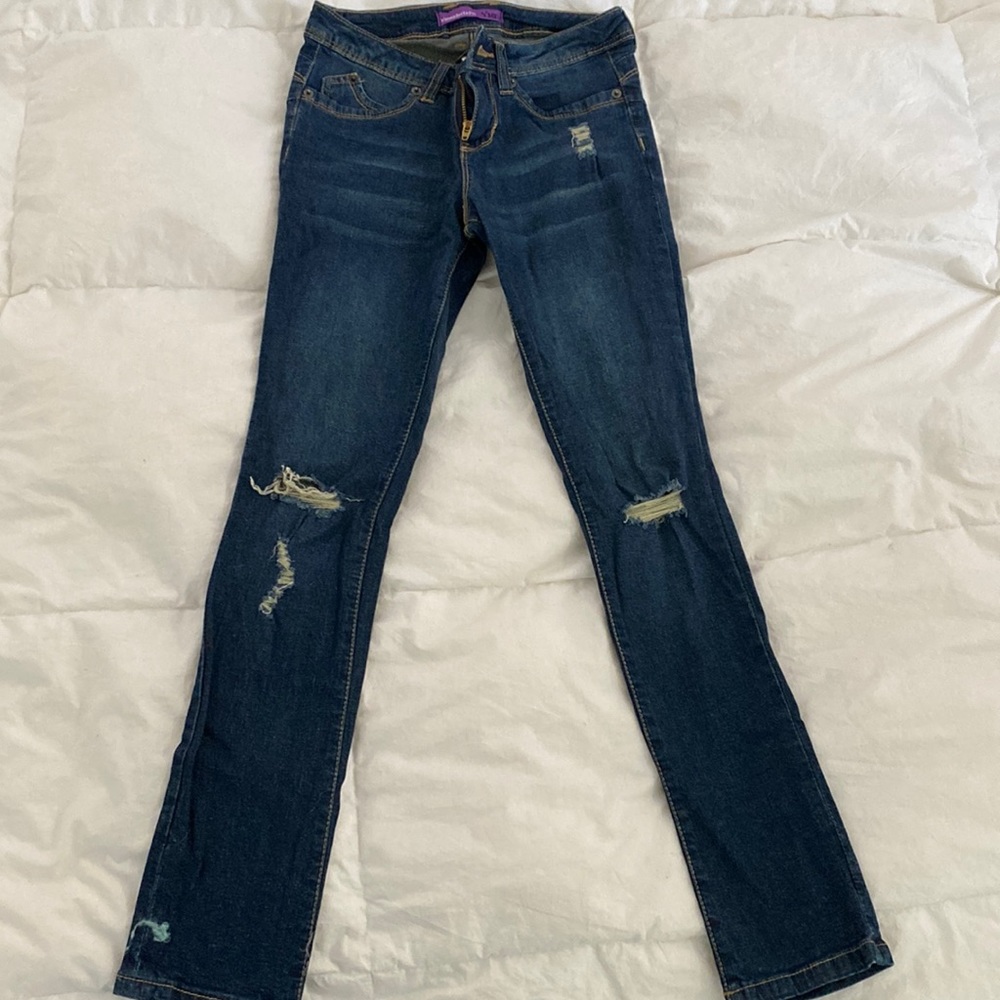 Girls jeans . Size 8 . Never worn.